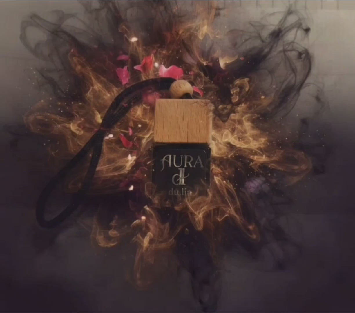 Premium AURA car freshener featuring spiced cardamom and oud with a smooth vanilla-amber finish.